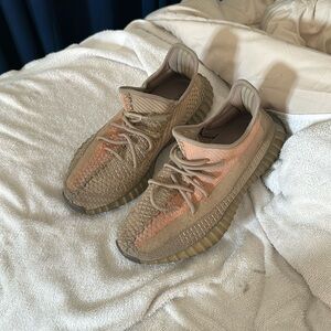 Used Yeezy. Size 10 does not come with box asking 150